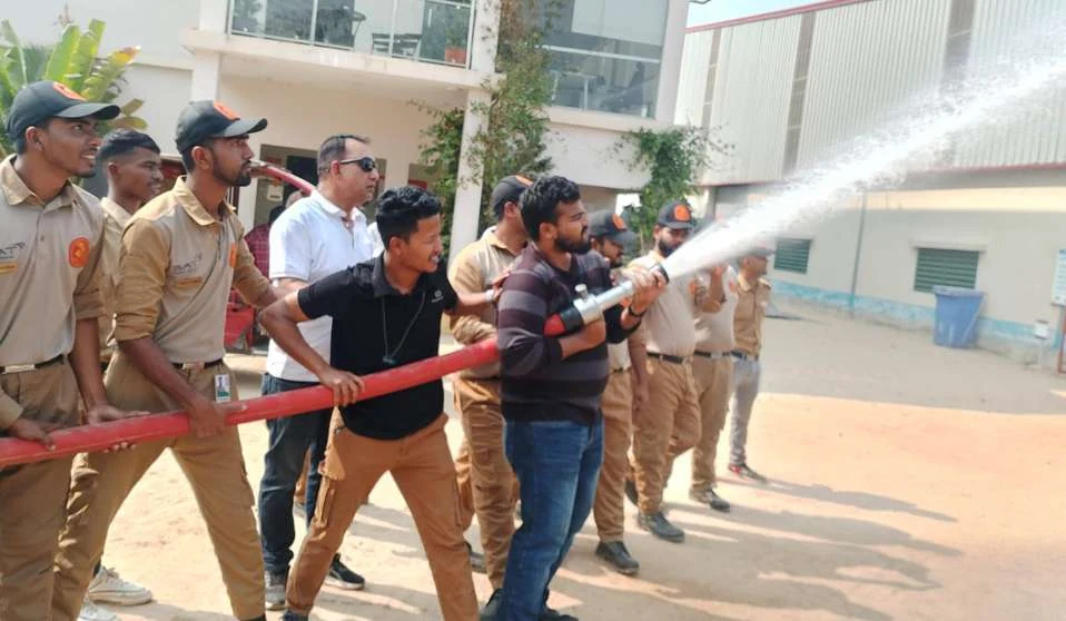 Fire hose demonstration at an outdoor facility