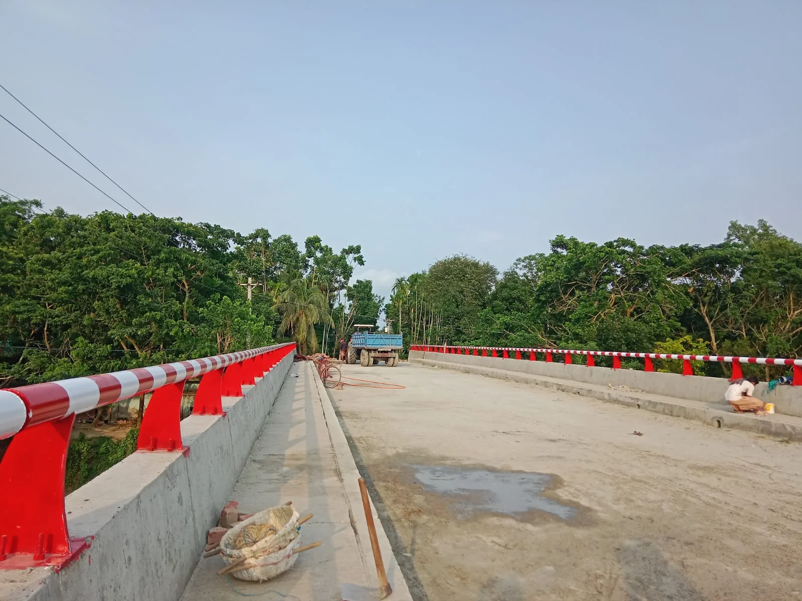 Painted railings along the bridge deck — Atharobaki Chun khola Bridge Railing