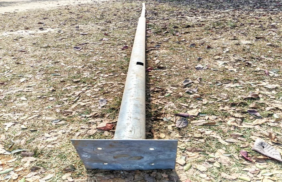 Steel street light pole prepared for installation