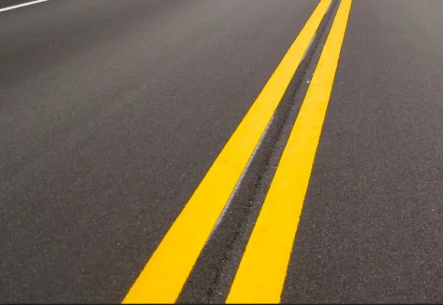 Fresh double yellow road lines
