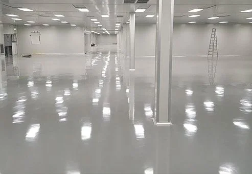Glossy grey floor in an industrial interior