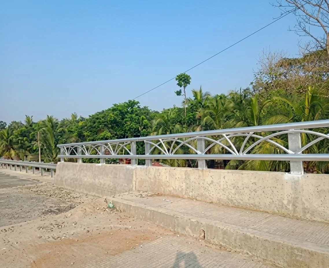 Metal railing along a bridge edge