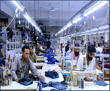 Overhead lighting in a garment production facility