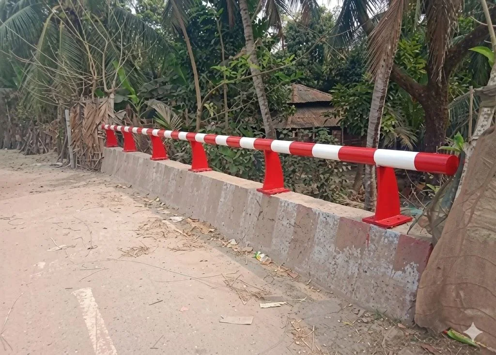Painted rail along a curved roadside