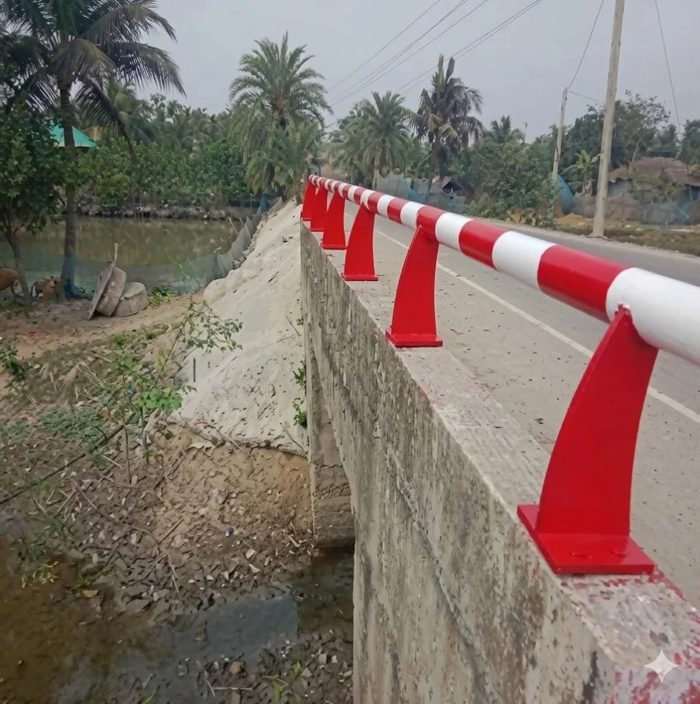 Red and white concrete roadside barriers