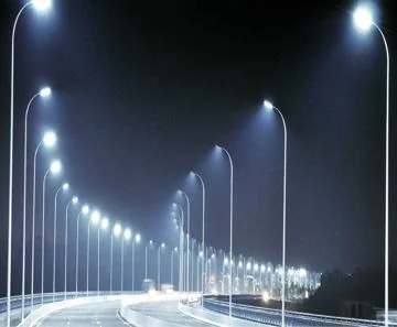 Rows of street lamps illuminated at night